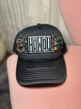 Howdy patch and feather trucker hat